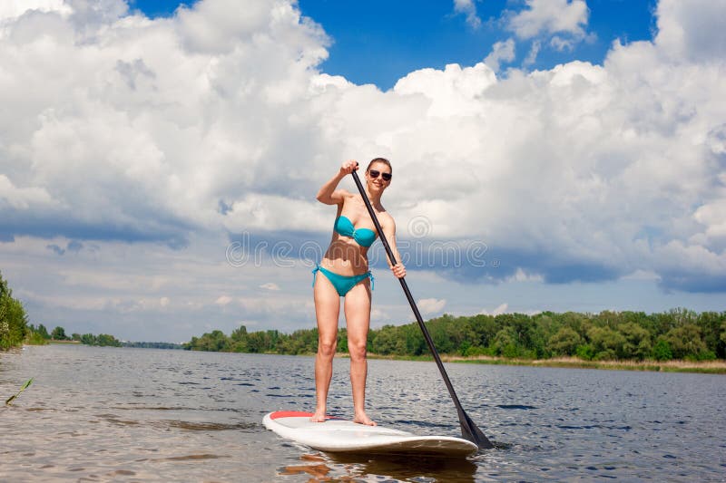 SUP Stand up paddle board woman paddle boarding05 royalty free stock photos SUP Stand up paddle board woman paddle boarding05 royalty free stock photos