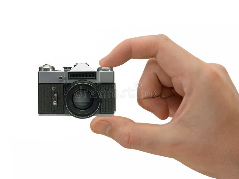 Super kompaktný fotoaparát v ruke, izolované na bielom pozadí.