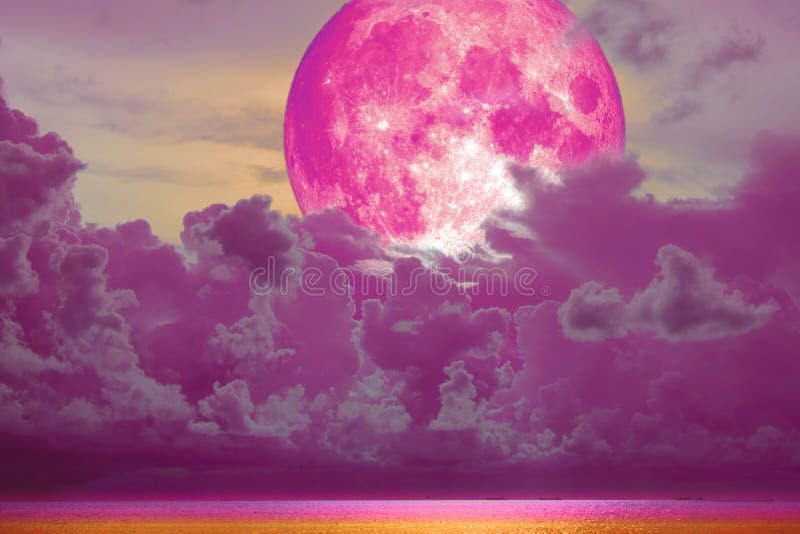 super full pink moon back magenta cloud over the sea