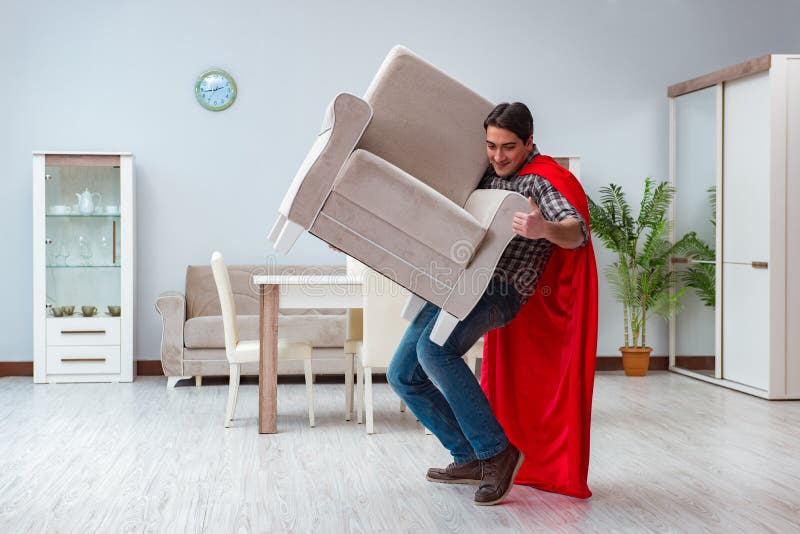 The Super Hero Moving Furniture at Home Stock Photo Image of