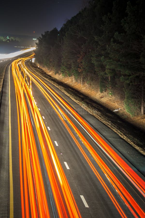 Super Highway With High Volume Of Cars At Night