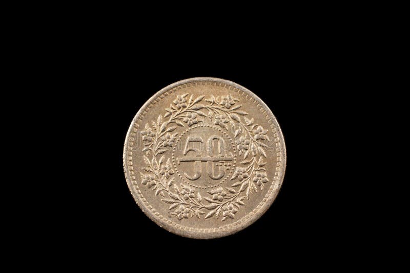 Old Pakistani Fifty Rupee Coin Isolated On Black royalty free stock image Old Pakistani Fifty Rupee Coin Isolated On Black royalty free stock image