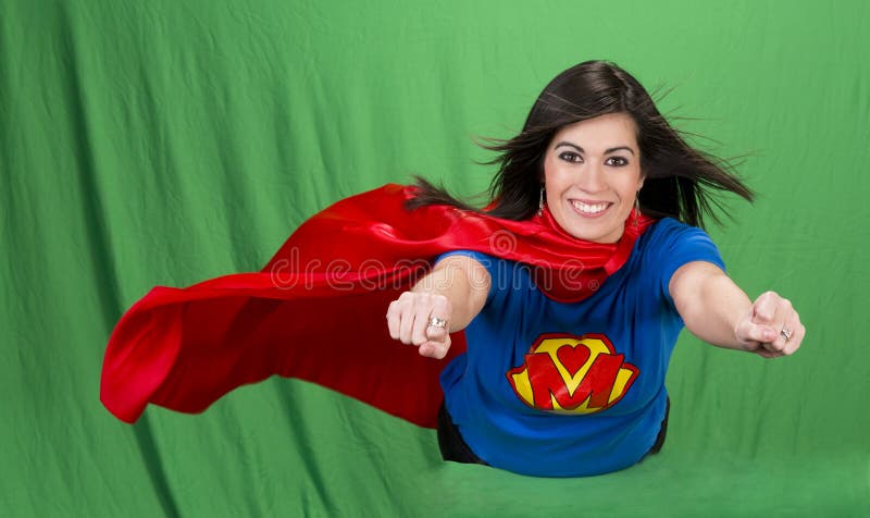 Beautiful woman plays super mom flying on green screen. Beautiful woman plays super mom flying on green screen