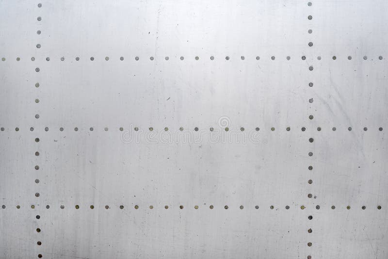 Superficie de aluminio del fuselaje de aviones foto de archivo libre de regalías Superficie de aluminio del fuselaje de aviones foto de archivo libre de regalías