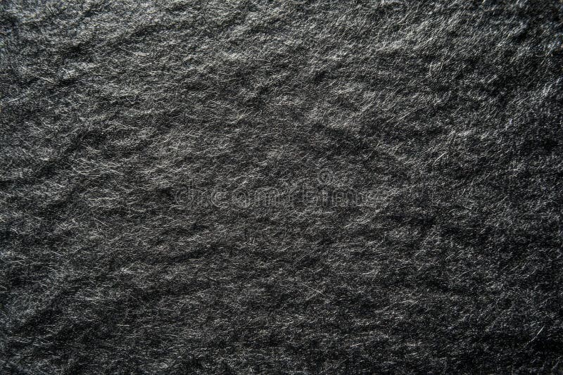 Superficie de piedra texturada oscura con sutil juego de luz. Red neuronal generada por IA imagen de archivo