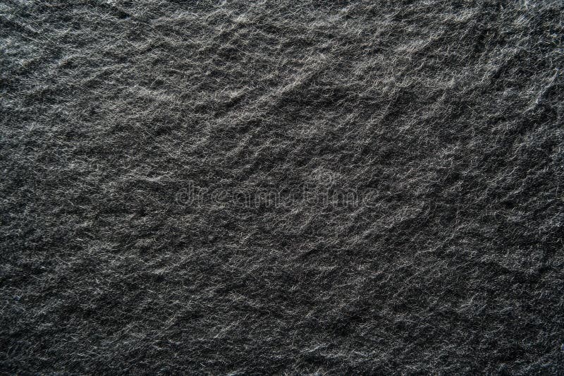 Superficie de piedra texturada oscura con sutil juego de luz. Red neuronal generada por IA fotos de archivo libres de regalías
