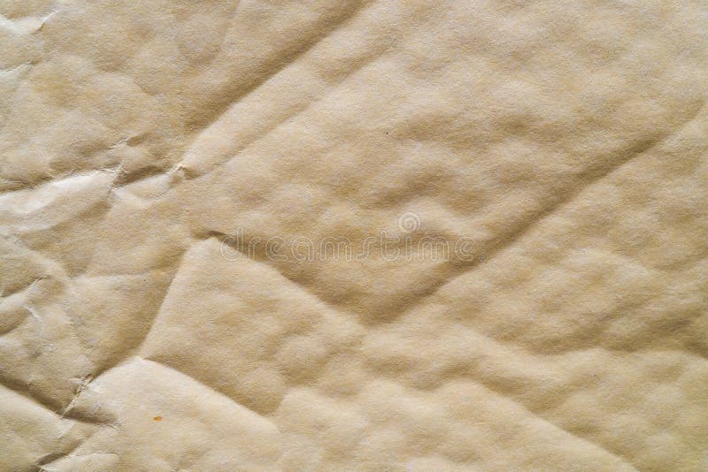 Superfície amarelada do pacote do papel do bubblewrap útil como um fundo fotos de stock Superfície amarelada do pacote do papel do bubblewrap útil como um fundo fotos de stock