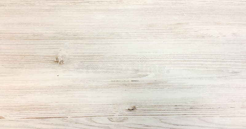 Light white wash soft wood texture surface as background. Grunge whitewashed wooden planks table pattern top view. Light white wash soft wood texture surface as background. Grunge whitewashed wooden planks table pattern top view