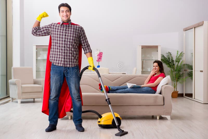 The Superhero Husband Helping His Wife At Home Stock Image Image Of