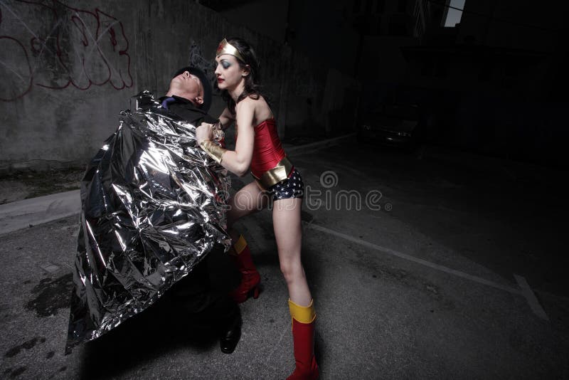 Superhero wrapping the criminal