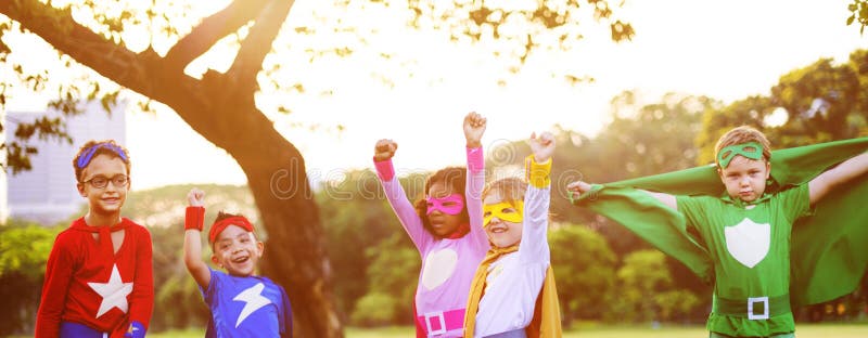 Superheroes Kids Friends Playing Togetherness Fun Concept stock photos Superheroes Kids Friends Playing Togetherness Fun Concept stock photos