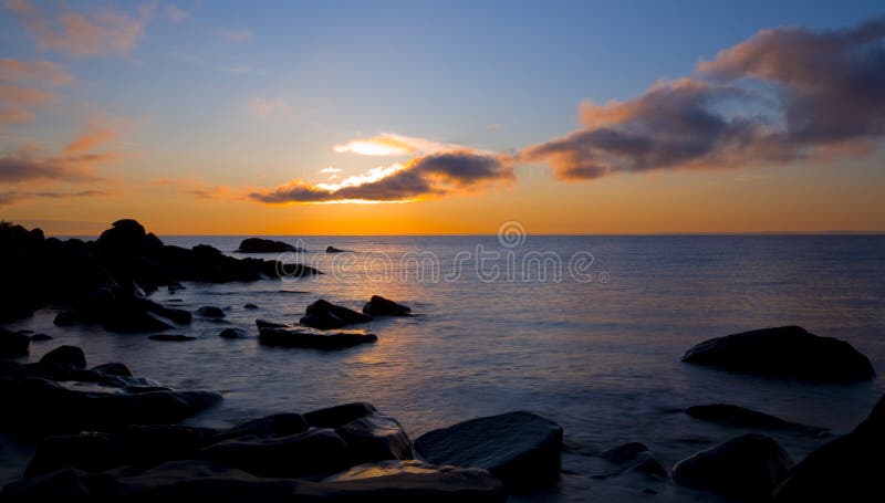 Superior Sunbeam from Cloud to Water to Stone