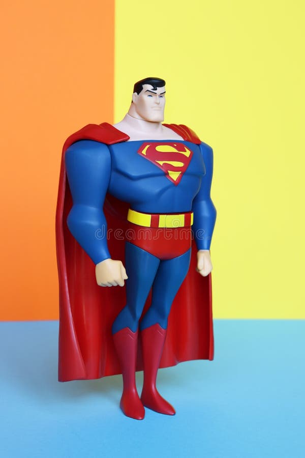 Supermancijfer aangaande pastelkleurenachtergrond royalty-vrije stock afbeelding Supermancijfer aangaande pastelkleurenachtergrond royalty-vrije stock afbeelding