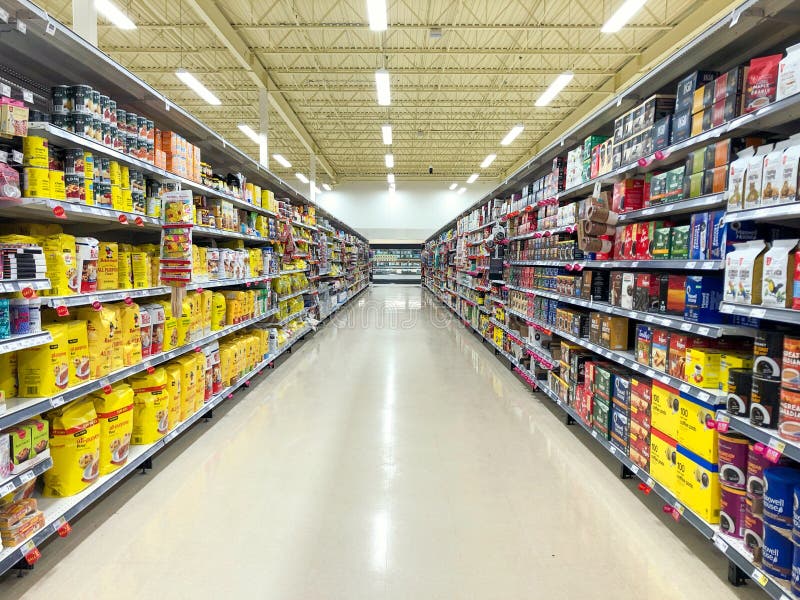 Supermarket - Grocery store with food section aisle - Editorial image