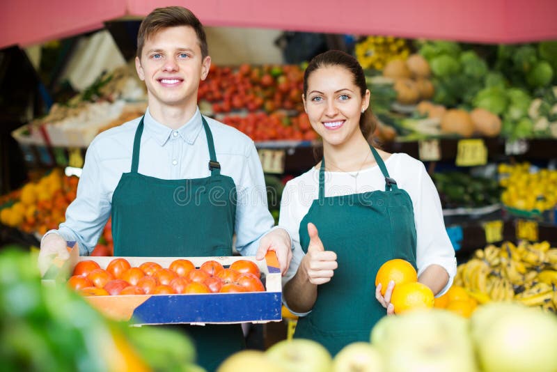 Supermarket Workers Selling Fruits Stock Photo Image of citrus, farm 67149248