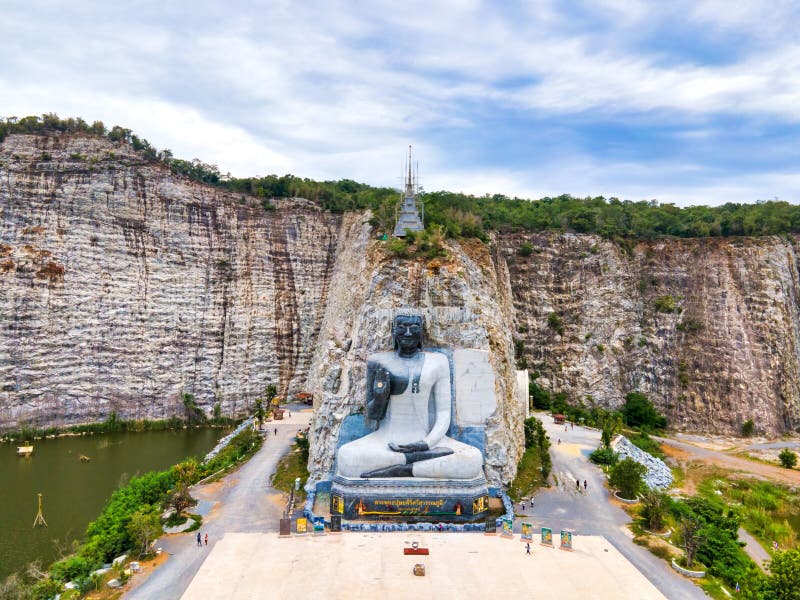 Suphan Buri / Thailand / August 15, 2020 :  Rock Buddha  Wat Khao Tham Thiam is the nme of a giant stone Buddha image in