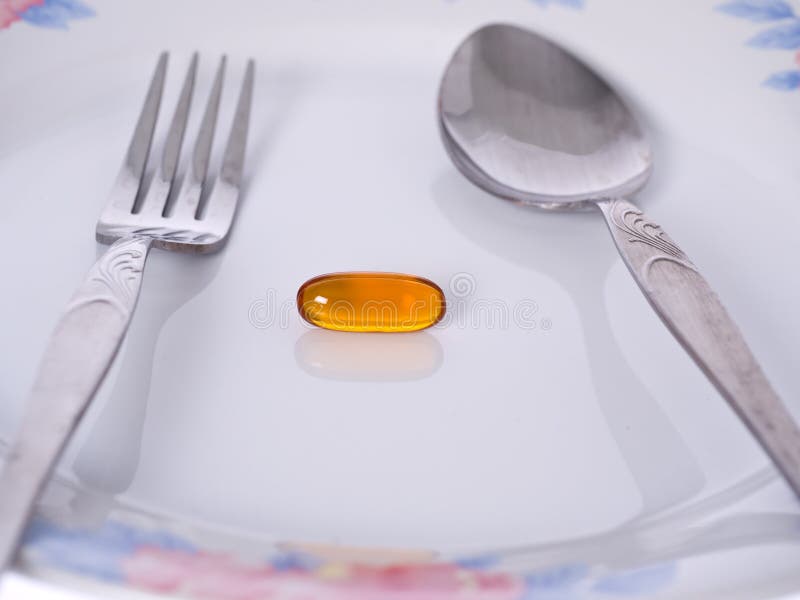 Supplementary Food On The Dish With Fork And Spoon Stock Photo Image