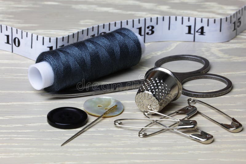 Thimble, Needle and Quilt stock image. Image of closeup - 10219921