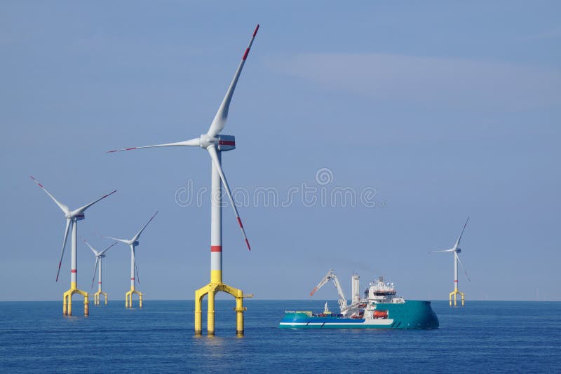 Supply boat with offshore wind turbine