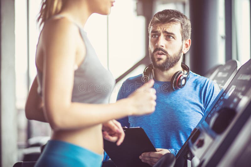 Support. Couple at gym stock photo. Image of effort 120098034