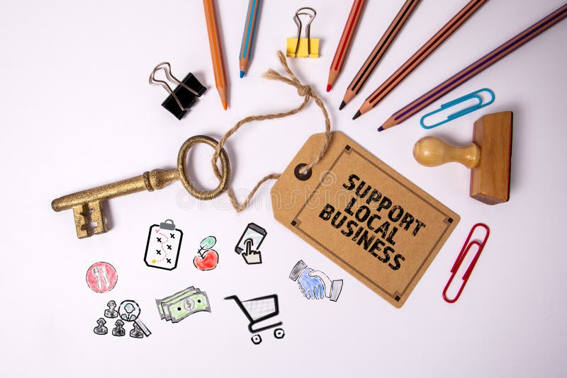 Support Local Business. Stationery on a White Office Table Stock Image