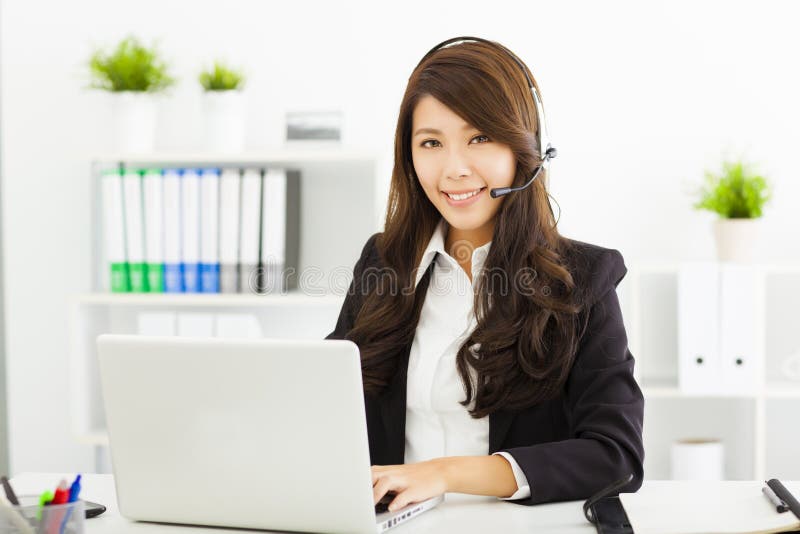 Young support phone operator in headset