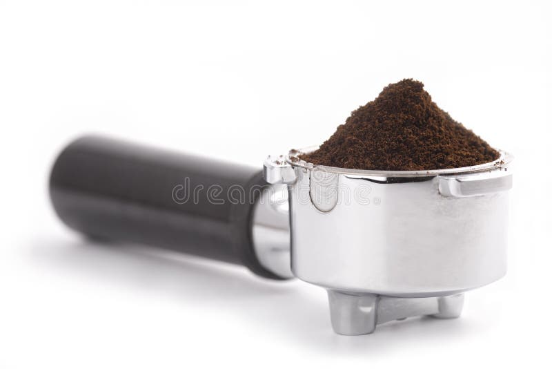 Filter holder for coffee machine, full of ground coffee. Filter holder for coffee machine, full of ground coffee.