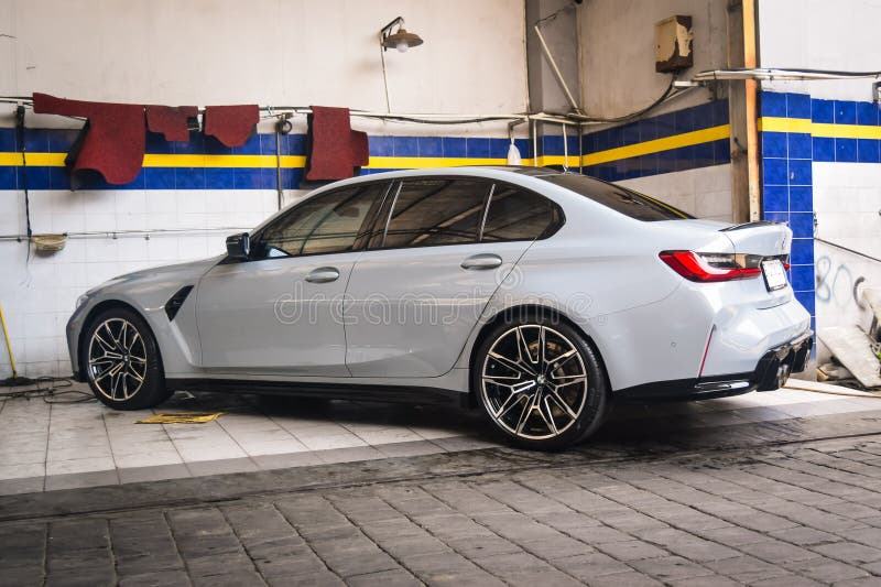 Surakarta Indonesia July 27 2023 G80 BMW M3 is the sixth generation of BMW M3. It available in four doors sedan and station wagon bodystyle. The engine is S58 six cylinders twin turbo that able to produced 510 horsepower. Surakarta Indonesia July 27 2023 G80 BMW M3 is the sixth generation of BMW M3. It available in four doors sedan and station wagon bodystyle. The engine is S58 six cylinders twin turbo that able to produced 510 horsepower