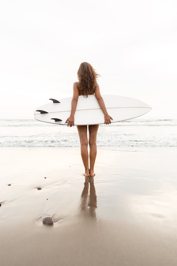 Beautiful Sporty Surfer Girl at the Beach. Stock Photo - Image of ...