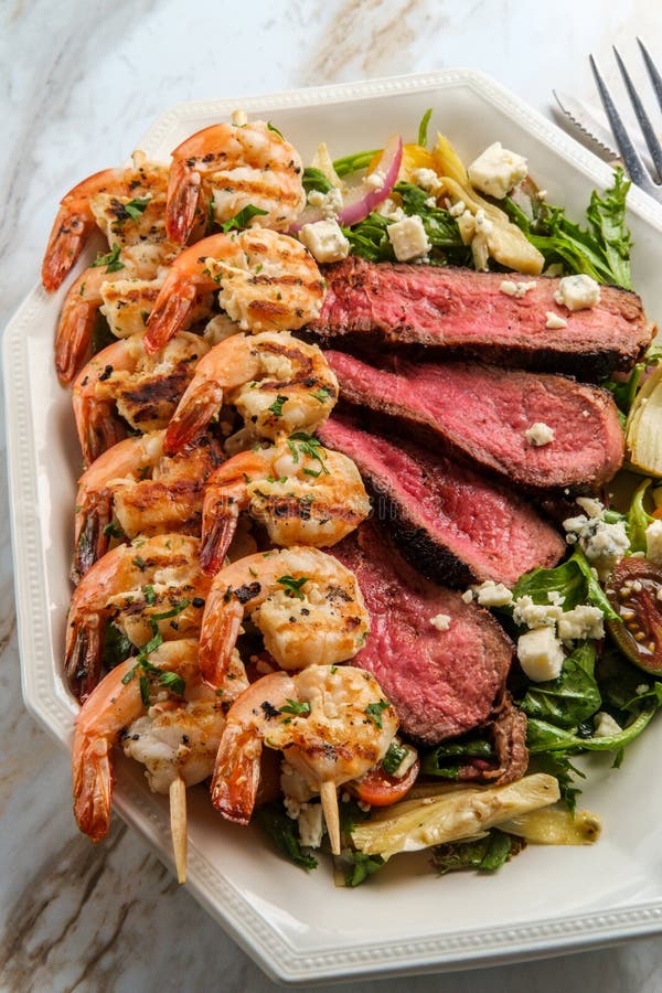Surf and Turf Salad stock photo. Image of plating, kebabs - 217223748