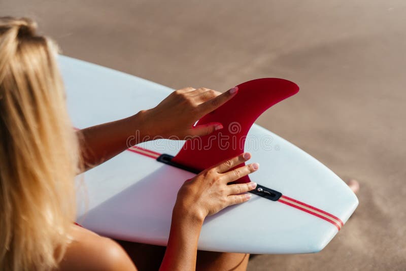 Blonde girl in bikini with surfboard - wide 9