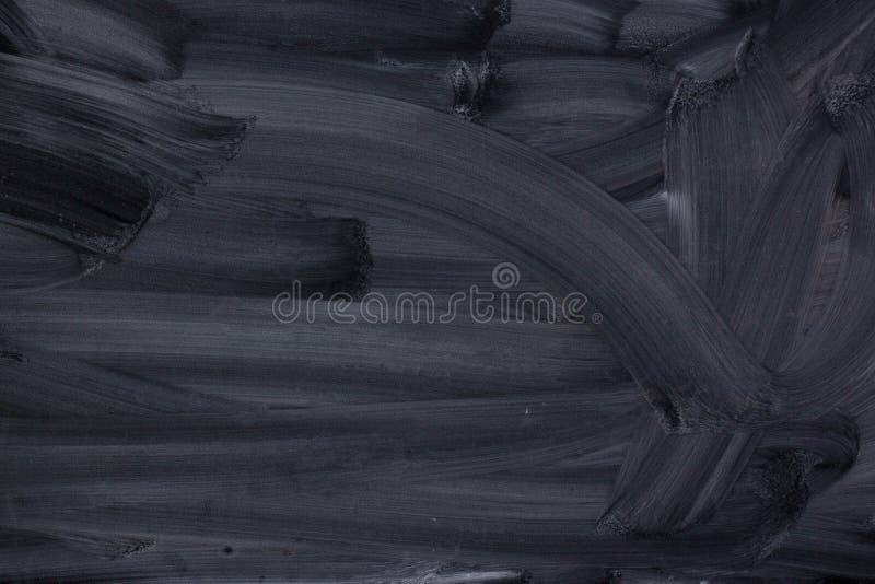 Surface of the Chalk Board is Black with the Texture of Streaks of
