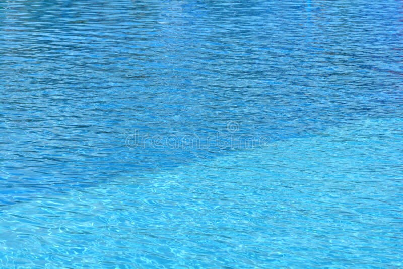Surface de l'eau de piscine photo stock Surface de l'eau de piscine photo stock