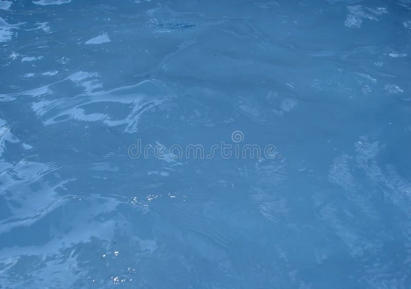 Surface gentille et propre de l'eau bleue photographie stock Surface gentille et propre de l'eau bleue photographie stock