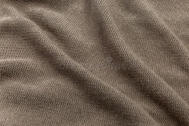 The Surface of a Knitted Fabric Laid in Waves. Hobby and Production. Closeup Stock Image