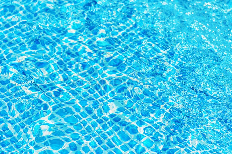 Surface Of Ripple Water In Swimming Pool With Sun Reflection Stock ...
