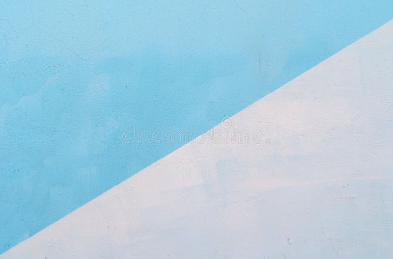 The Surface of the Wall is Painted Blue and White. Stock Image Image