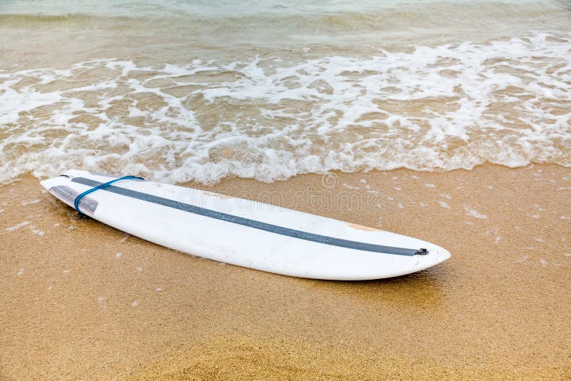 Surfboard Lying on Sand Near the Ocean Stock Image Image of summer