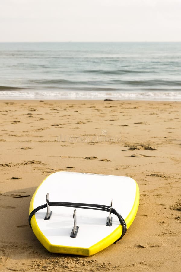 Surfboard on the sand stock photo. Image of beach, waves 53853280