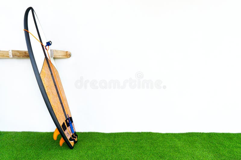 Surfboard on a wall rack stock images