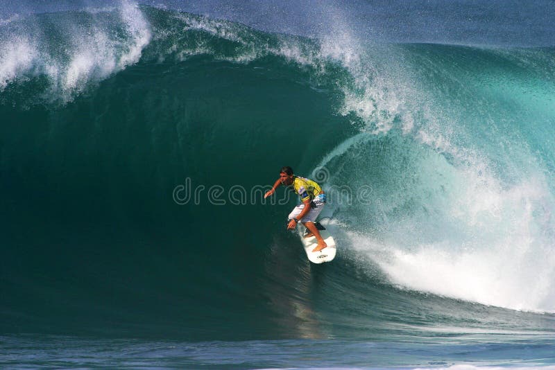 Surfer Andy Irons Surfing in Heimelijk Hawaï royalty-vrije stock afbeelding Surfer Andy Irons Surfing in Heimelijk Hawaï royalty-vrije stock afbeelding