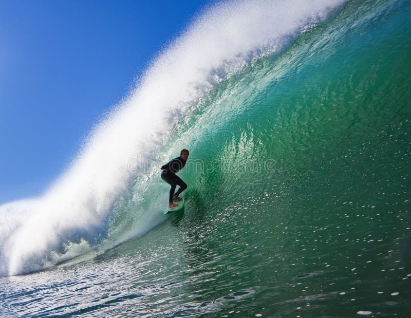 Surfer in the Barrel stock photo Surfer in the Barrel stock photo
