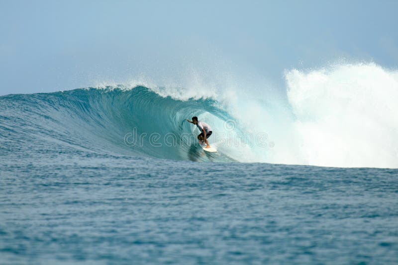 Surfer in barrel getting tube view, Indonesia