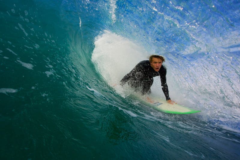 Surfer on Blue Wave in Tube