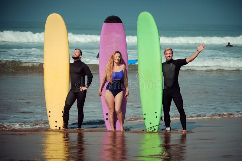 Surfer Friends on a Beach with a Surfing Boards Stock Image Image of