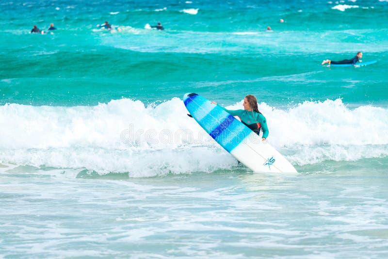 Surfer girl at Bondi Beach