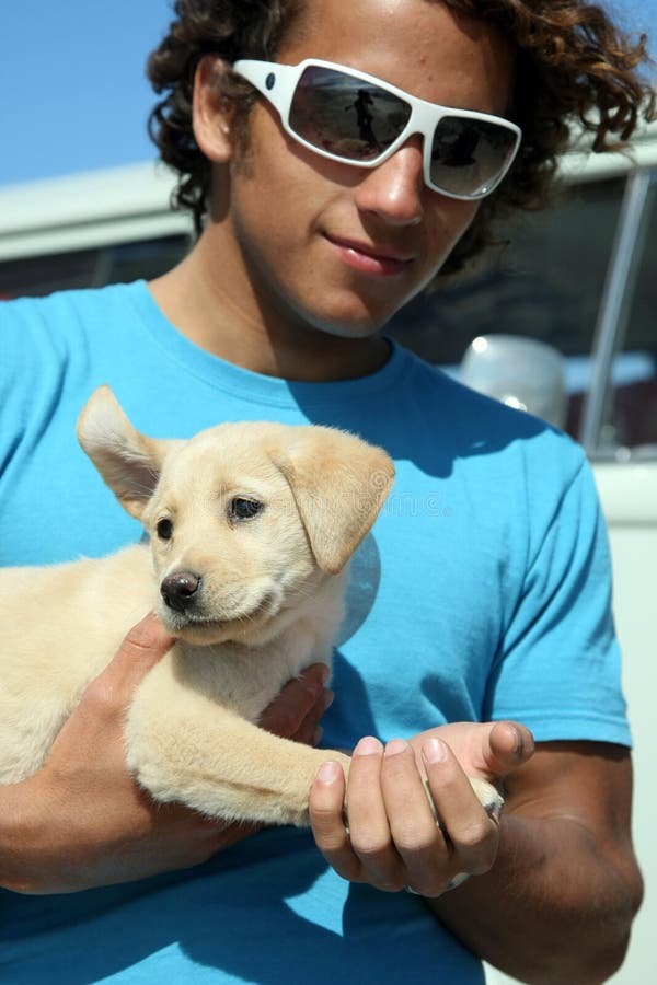 Surfer guy and his dog