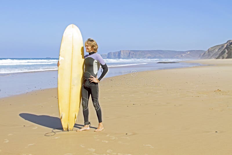 Surfer with his surfboard stock photo. Image of surfing 29934060