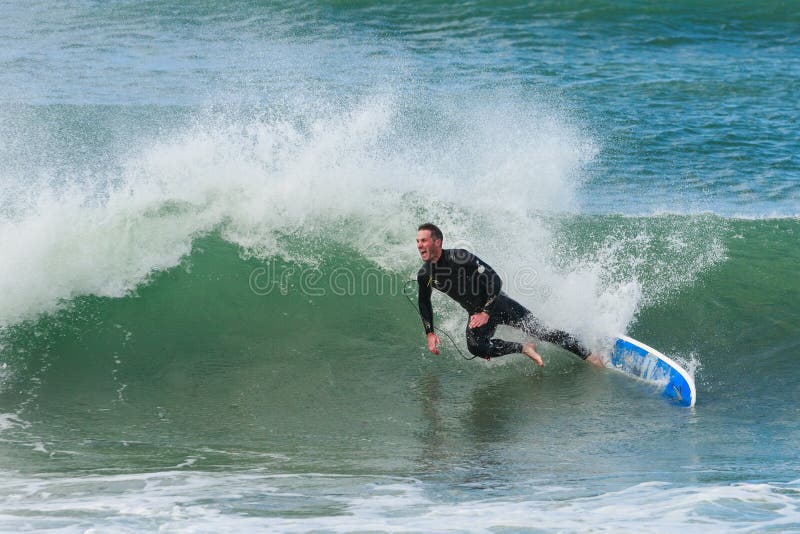 person flying off a surfboard into the waves person flying off a surfboard into the waves