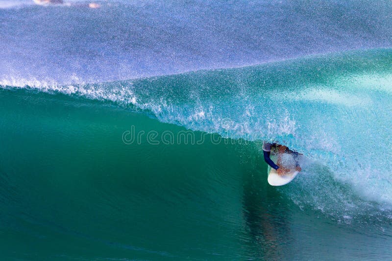 Surfer Perfect Wave Tube Ride